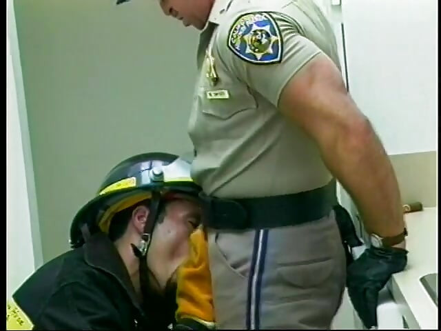 Wild handsome cop gives blowy with passion in the office