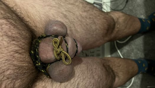 Cock and ball bondage under swimsuit with nipple clamps