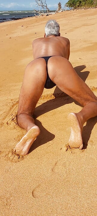 Ladysilva on the beach in panties showing off her hot ass
