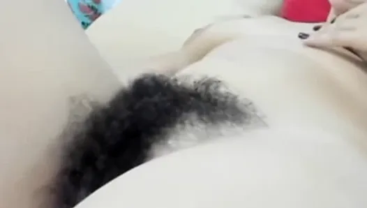Mature amateur with a very hairy cunt, close-up