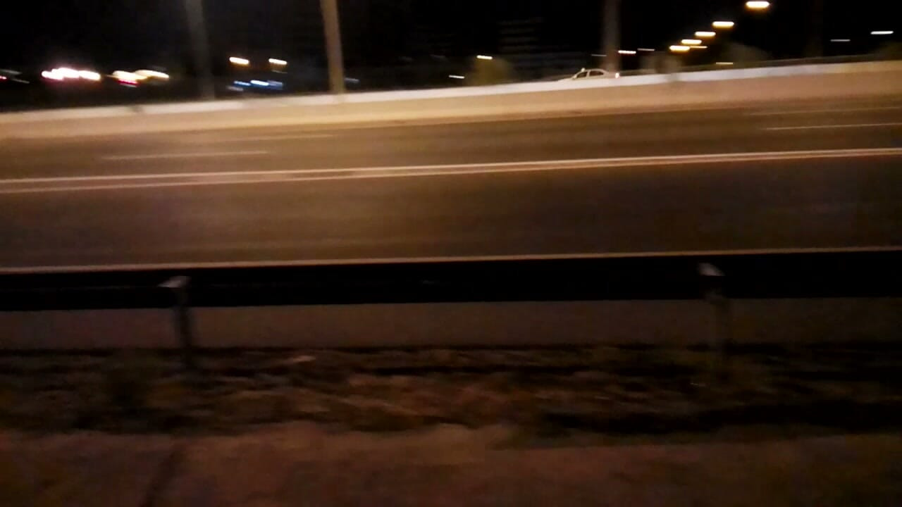 Naked near the road at night