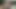 Koyu saçlı bomba götünü parmaklatıyor ve kırmızı bir kanepede sikiliyor