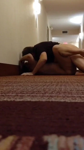 Emotional moment from "Scared sex in hotel hallway"