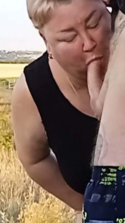 fat woman holds my dick while I pee after jerking off sucks cock close up | Clip 1