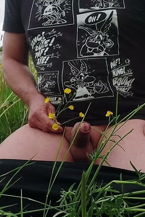 Outdoor Jerking off Playful My Cock in a Flower Meadow and Spraying My Semen Into Nature.