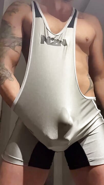 Muscle jock in lycra with huge cock thrusting until he cums