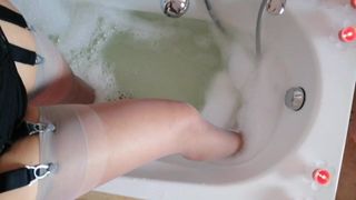 the slave slut of black cocks, takes a bath in stockings2