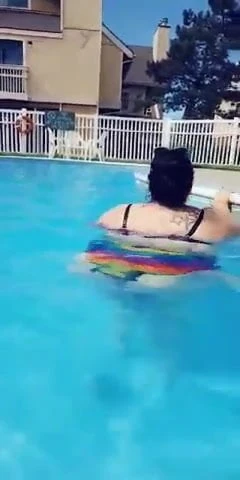 Latina with fat ass at the swimming pool