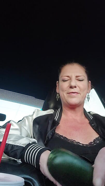 MILF Masturbates and Squirts with Huge Cucumber in Grocery Store Parking Lot