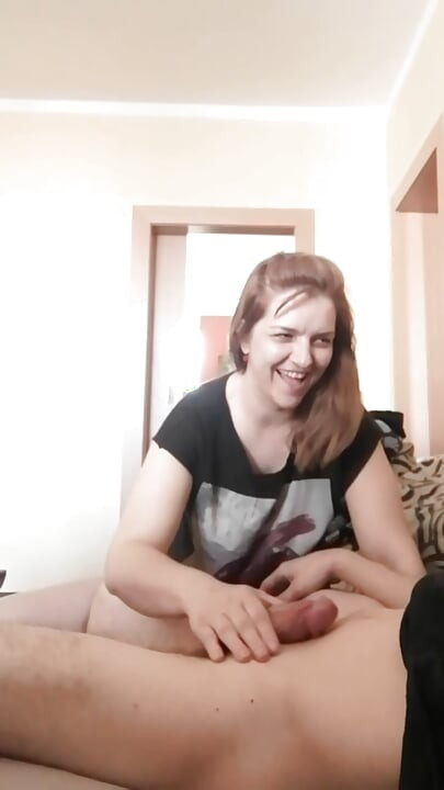 While he watches TV, I give him a blowjob