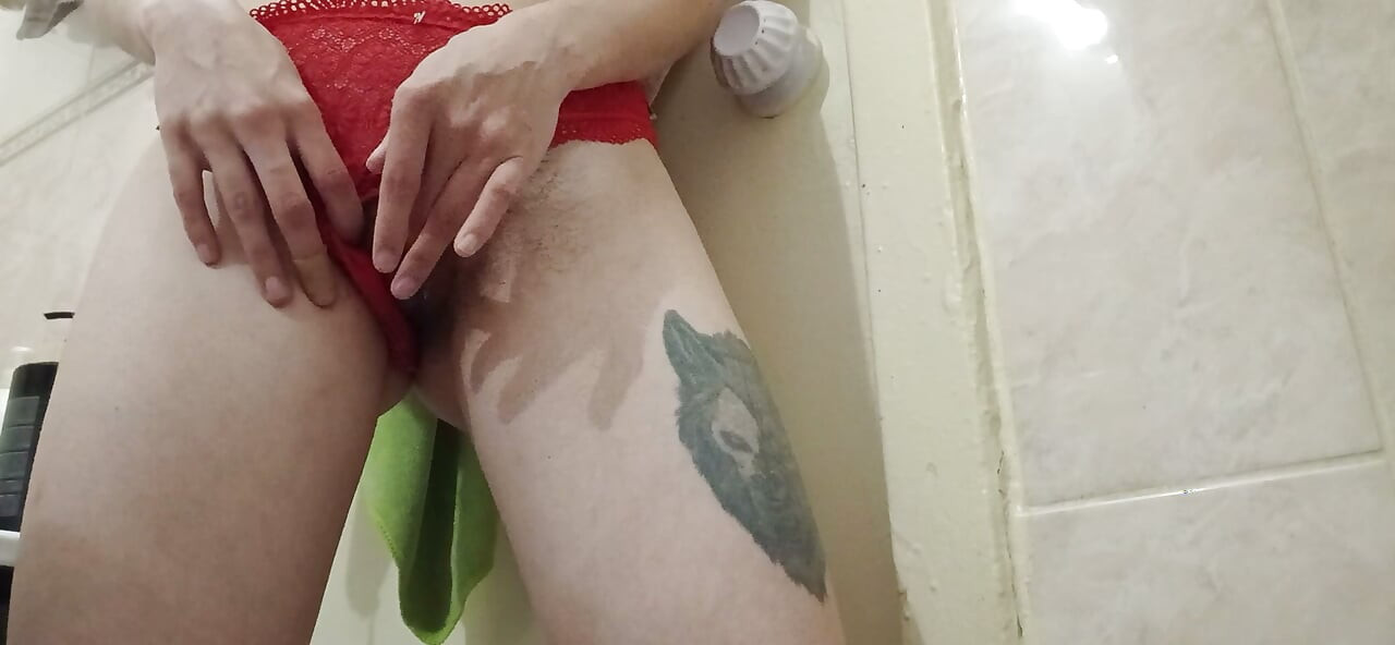 A skinny student girl in red panties masturbates her hairy pussy