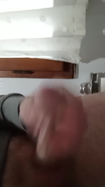 Cumshot in the bathroom secretly