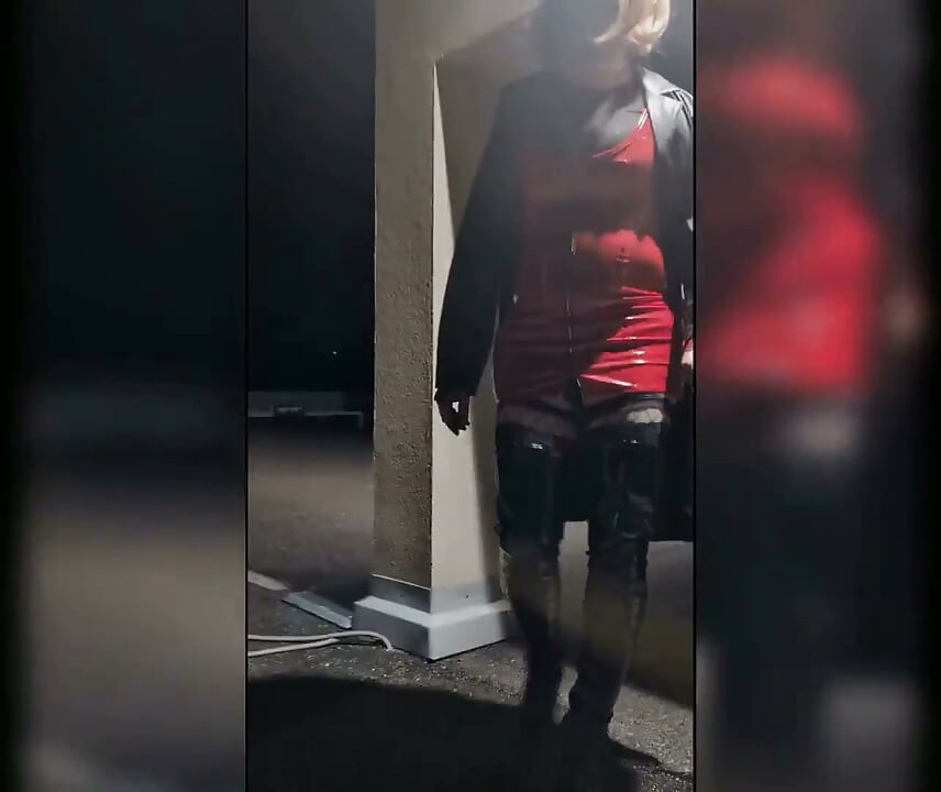 Walk in Parking House, Blonde in Overknee Boots, Red Pvc Dress and Long Leather Coat