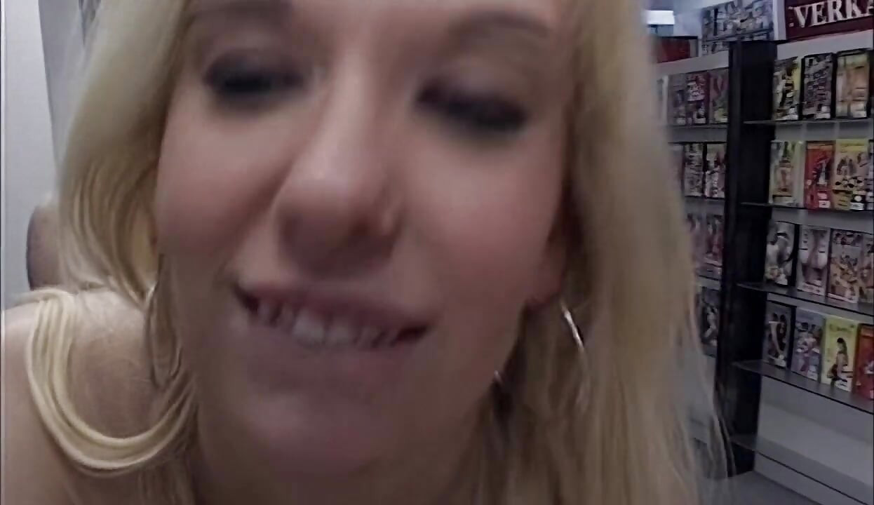 Blonde Is Fucked by Three Guys in the Video Store and Has to Blow