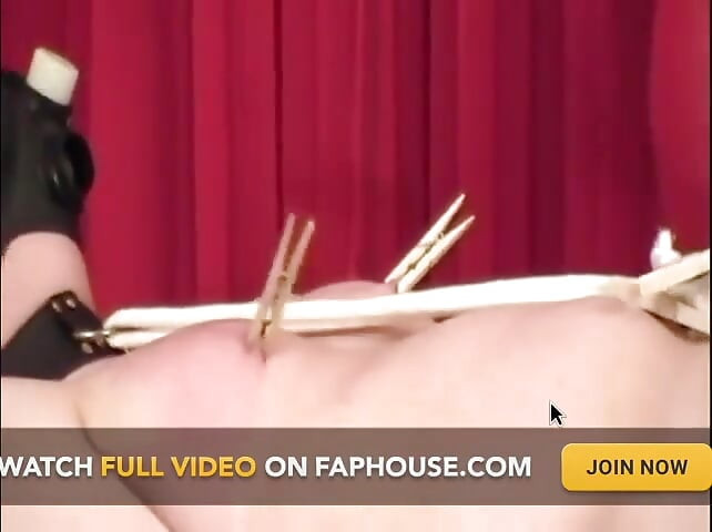 Tied up slave gets tormented and whipped