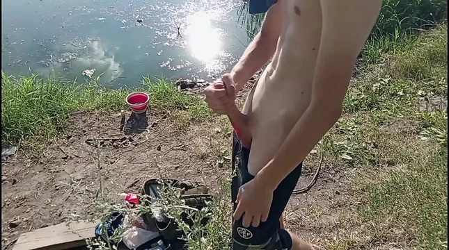 Guy jerking off in nature and fishing