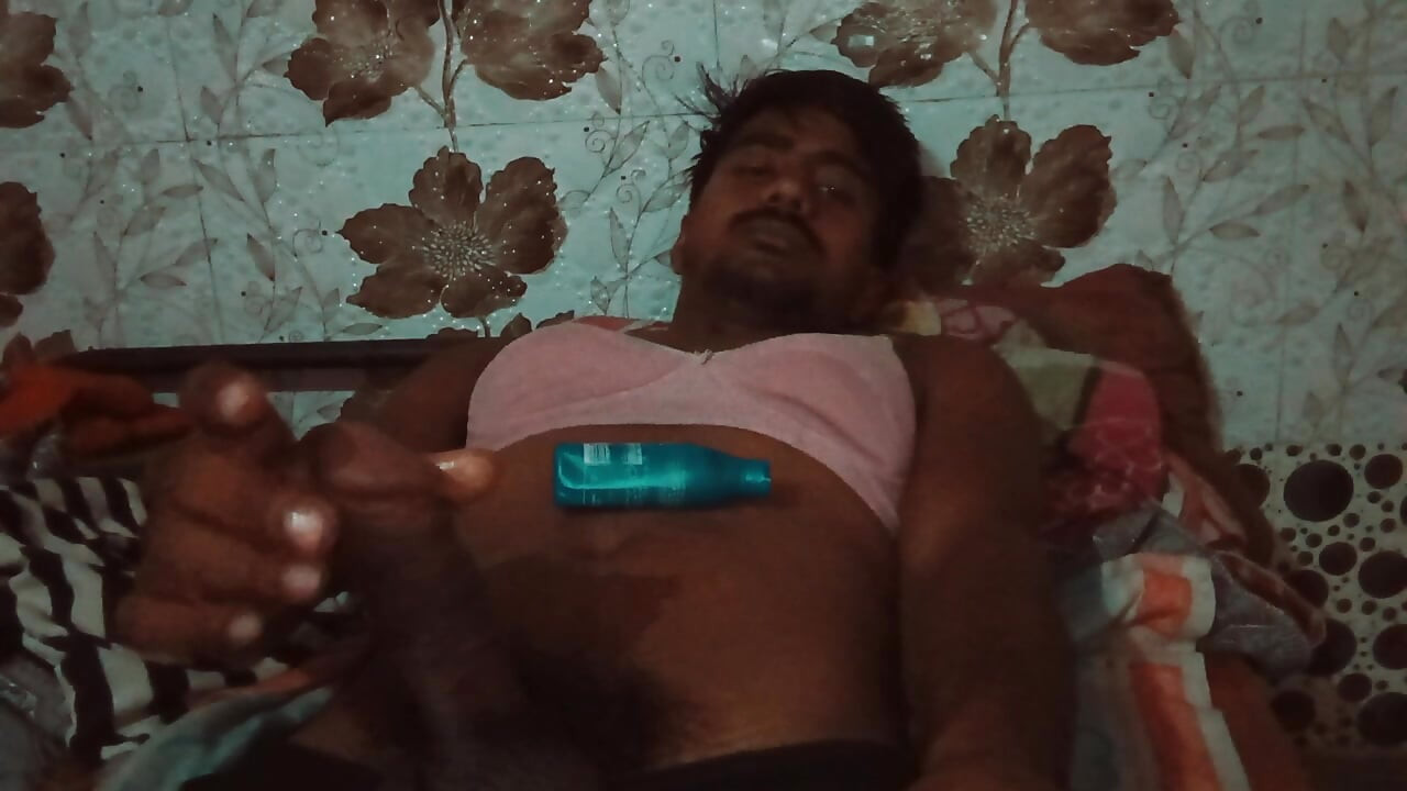 Massage of a big penis with black hair