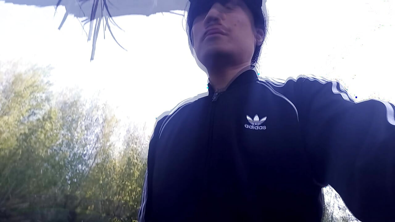 Who will spot this twink in a black and white adidas tracksuit, flashing his cock in public going commando freeballing, peeing i