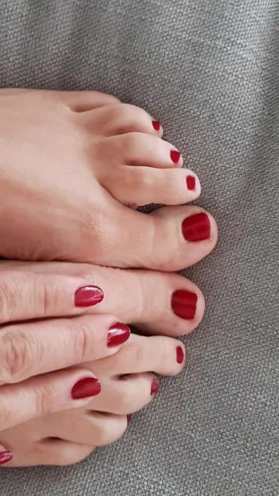 Red nails and beautiful feet