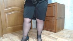 Sexy BBW in stockings and latex gloves desperately needs to pee
