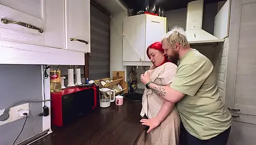 Sex in the kitchen with a red-haired wife. .
