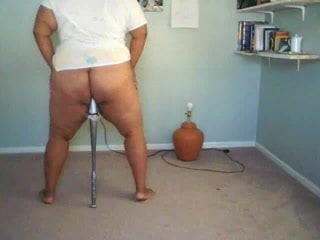 Black girl plays with bat on cam