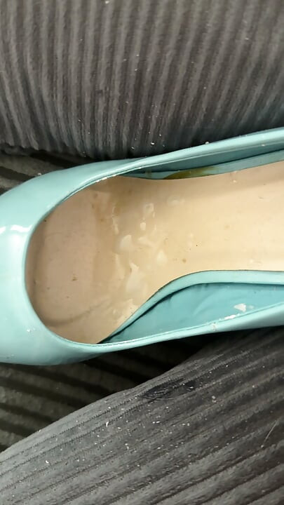 Cumming in pale blue patent heels