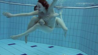 Two hot hairy beauties underwater