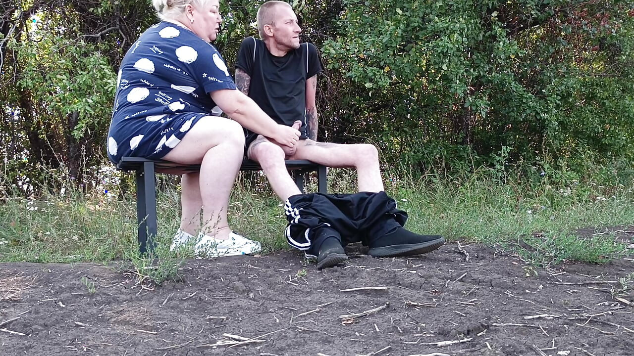 A neighbor in a public park jerks off my dick until I cum