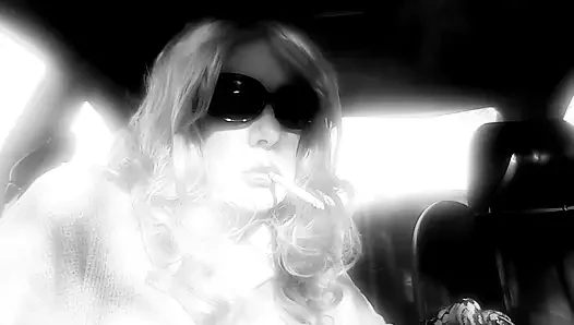MRS. ROMAN SMOKING MARLBORO 100's IN HER CAR