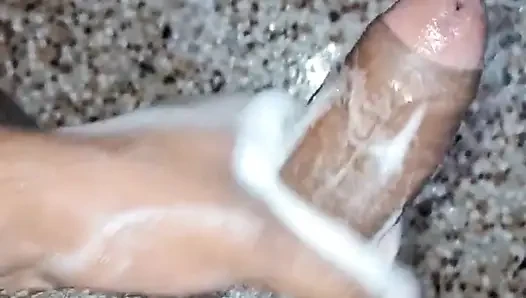 A Young Hindu Boy From India Is Fucking His Thick Cock Hard with His Hands While Taking a Bath