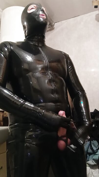 Latex guy jerks off and cums