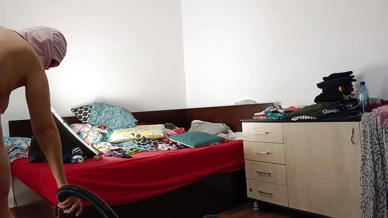 Amateur wife vacuuming in the bedroom. Amateur wife gives me a handjob until I cum.