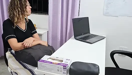 Medical examination of the patient's abdomen in the doctor's office.