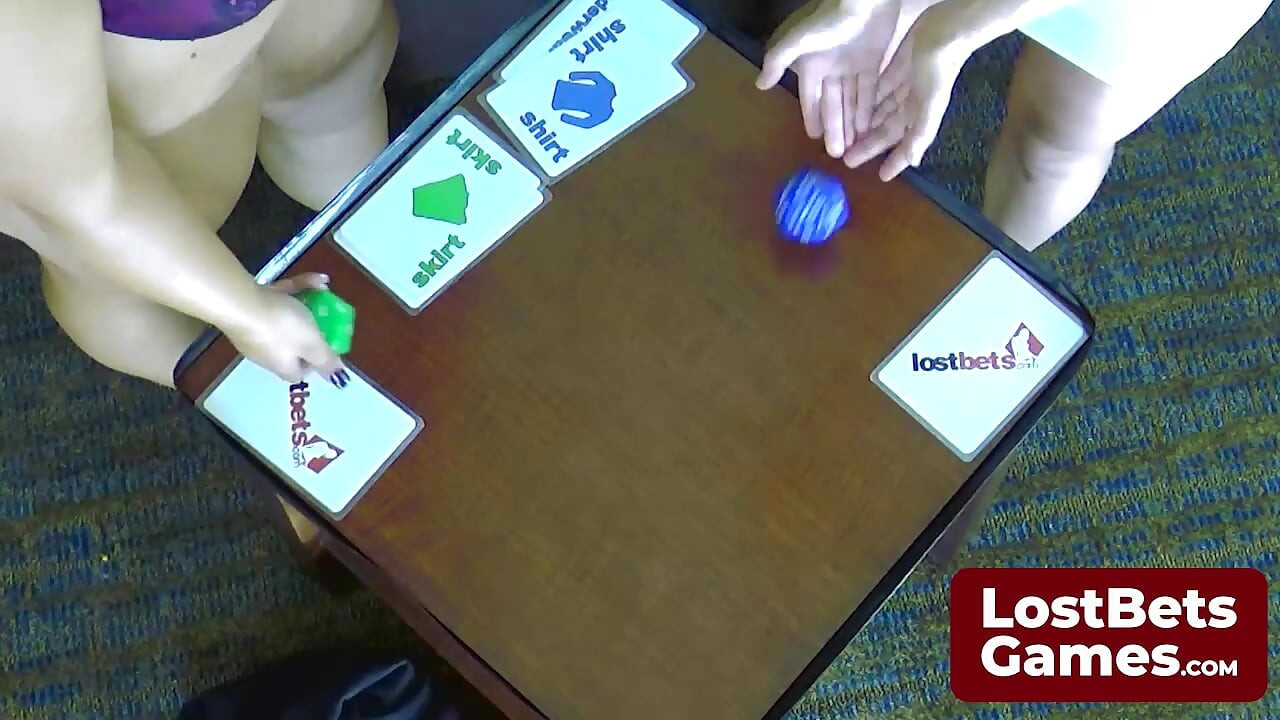 Blonde Dee Williams plays Strip Dice against towering Chels