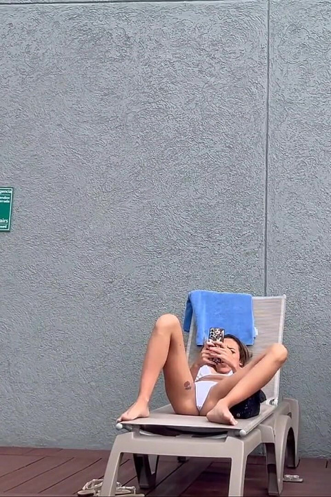 I Filmed My Famous Neighbor Sunbathing with Dental Floss on
