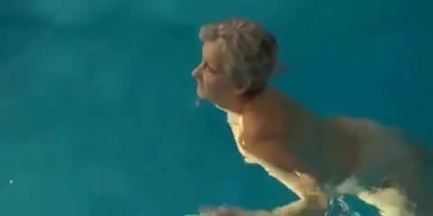 Granny in the pool with dildo inflatable