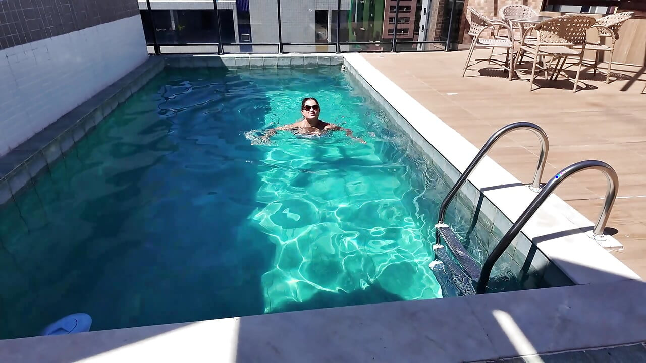 stepMom seduced her stepson in a public pool &amp; blowjob