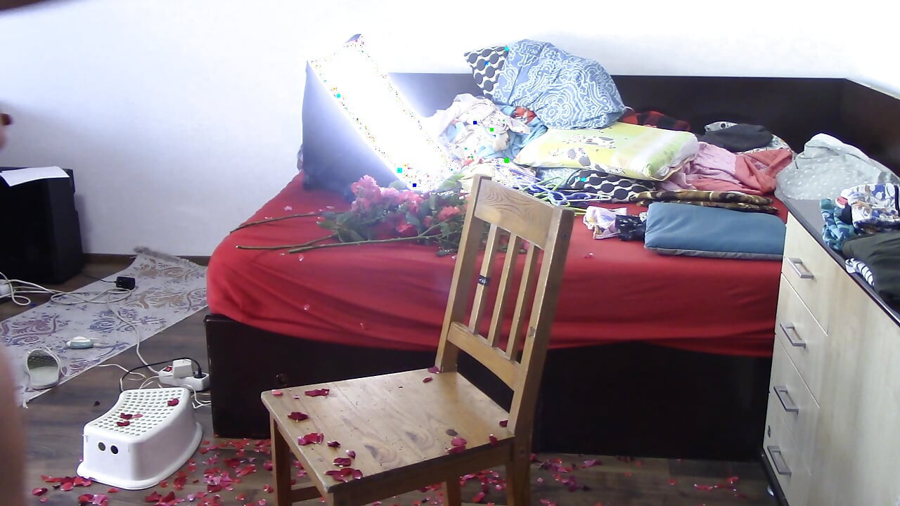 Sexy has fun with roses naked. The sexy epilates the hair on her legs.