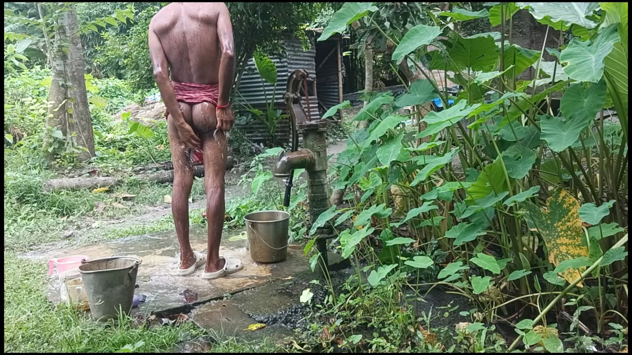 Tha naked Indian mature man shower in open place and showing body and dick..