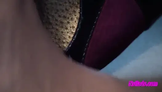 In the Office Wearing Black and Purple Pumps