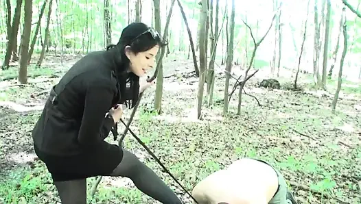 Mistress punishing her slave by putting high heels inside his mouth