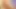 Two hot blondes fuck with a black double ended dildo on the sofa