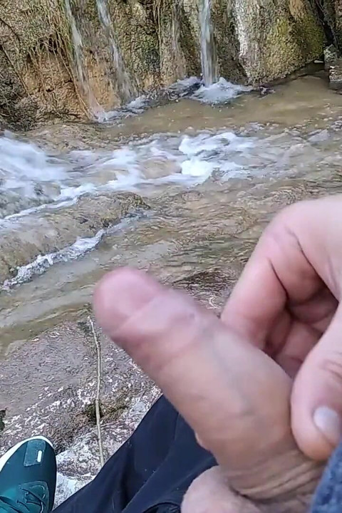 Handsome Gives Perfect Cumshot From Nice Big Hard Cock Spit in Front of River Waterfall