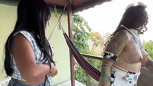 Two horny girls get wild on the balcony and eat each others pussy