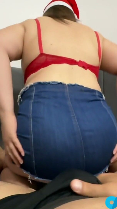 Santa Babe on the Bed in a Short Red Skirt - Playful Xmas Vibes | Clip 1