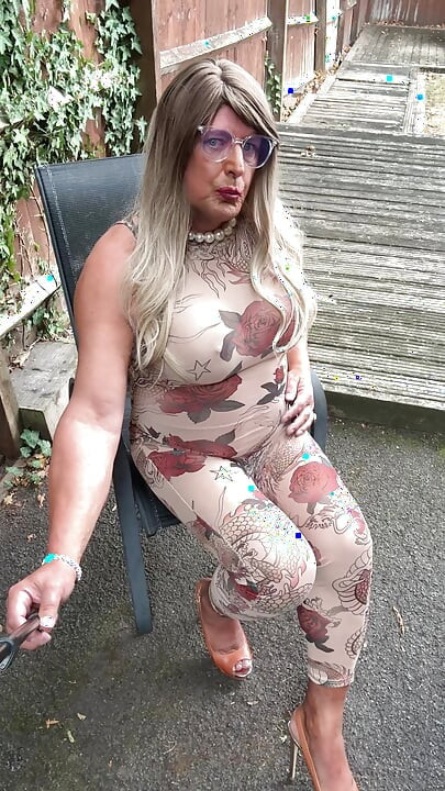 Sexy Crossdresser kellycd2022 in sexy floral see thru catsuit and heels