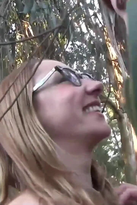 Outdoor lesbian licking.