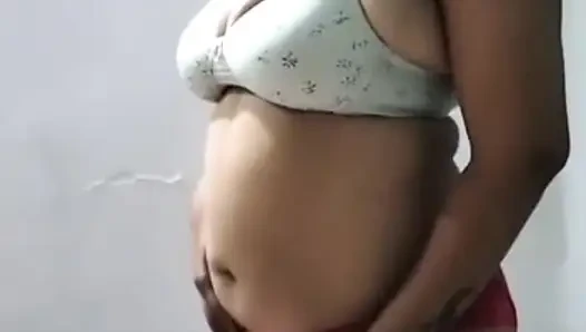 Hot desi bhabhi undressing herself