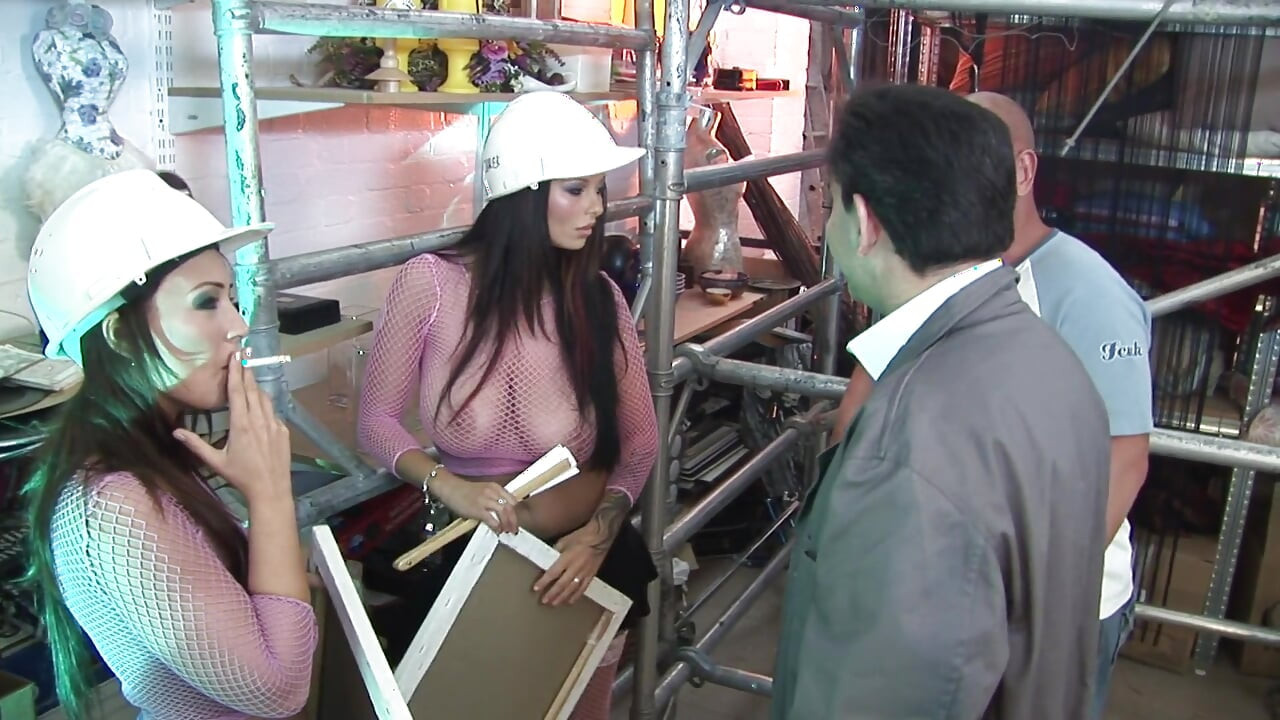 Brunettes with juicy tits get fucked in a building site